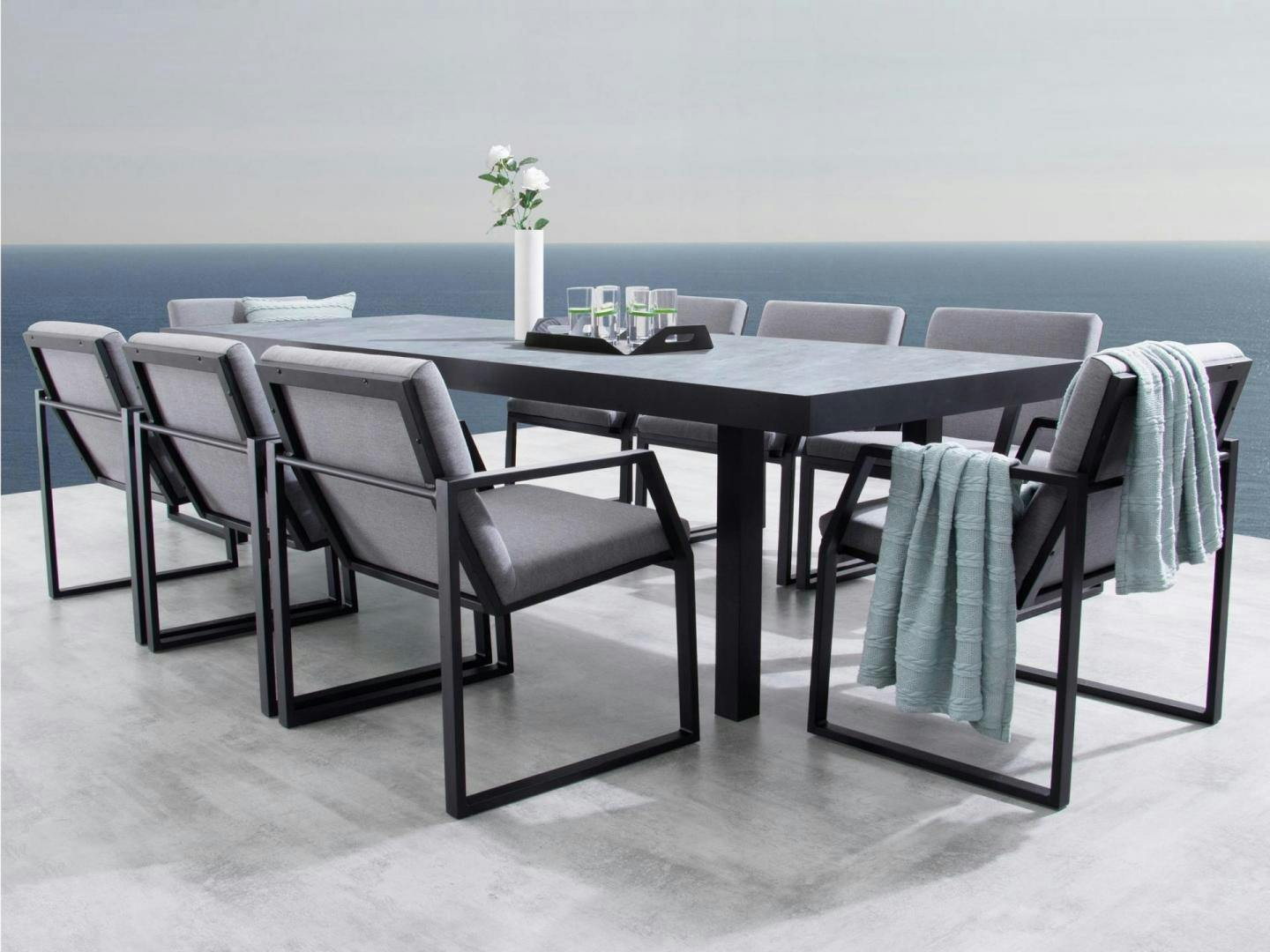 Invini Black Large 9-piece Outdoor Ceramic Dining Set