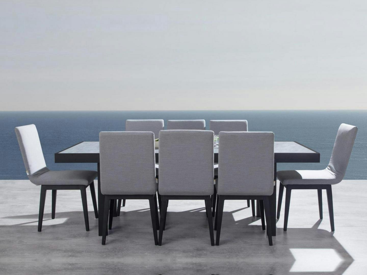 Invini Black 9-piece Outdoor Ceramic Dining Set With Kroes Chairs