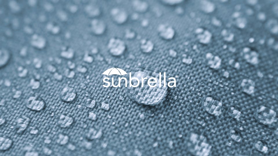 Image of Sunbrella fabric beading with water on the surface